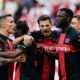 Leverkusen's players celebrate after Mainz's Sepp van den Berg scored an own goal, during a German Bundesliga soccer match between FSV Mainz 05 and Bayer Leverkusen, at the Mewa Arena in Mainz, Germany, Saturday Sept. 30, 2023. (Uwe Anspach/dpa via AP)