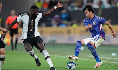 Antonio Ridiger i Japanac Mitoma na prijateljskom meču