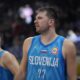 Slovenia guard Luka Doncic (77) celebrates after winning against Italy during the Basketball World Cup classification match in Manila, Philippines, Saturday, Sept. 9, 2023.