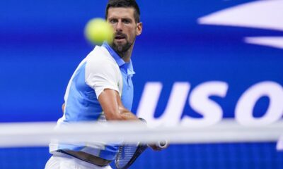 Novak Djokovic, of Serbia, returns a shot to Ben Shelton, of the United States, during the men's singles semifinals of the U.S. Open tennis championships, Friday, Sept. 8, 2023, in New York.