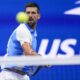 Novak Djokovic, of Serbia, returns a shot to Ben Shelton, of the United States, during the men's singles semifinals of the U.S. Open tennis championships, Friday, Sept. 8, 2023, in New York.