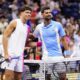 Ben Shelton, left, of the United States, and Novak Djokovic, of Serbia, pose for photographs ahead of their match during the men's singles semifinals of the U.S. Open tennis championships, Friday, Sept. 8, 2023, in New York.