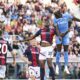 Napoli's Victor Osimhen, top right, heads the ball during the Serie A soccer match between Bologna and Napoli at the Renato Dall'Ara stadium in Bologna, Italy, Sunday, Sept. 24, 2023. (Massimo Paolone/LaPresse via AP)