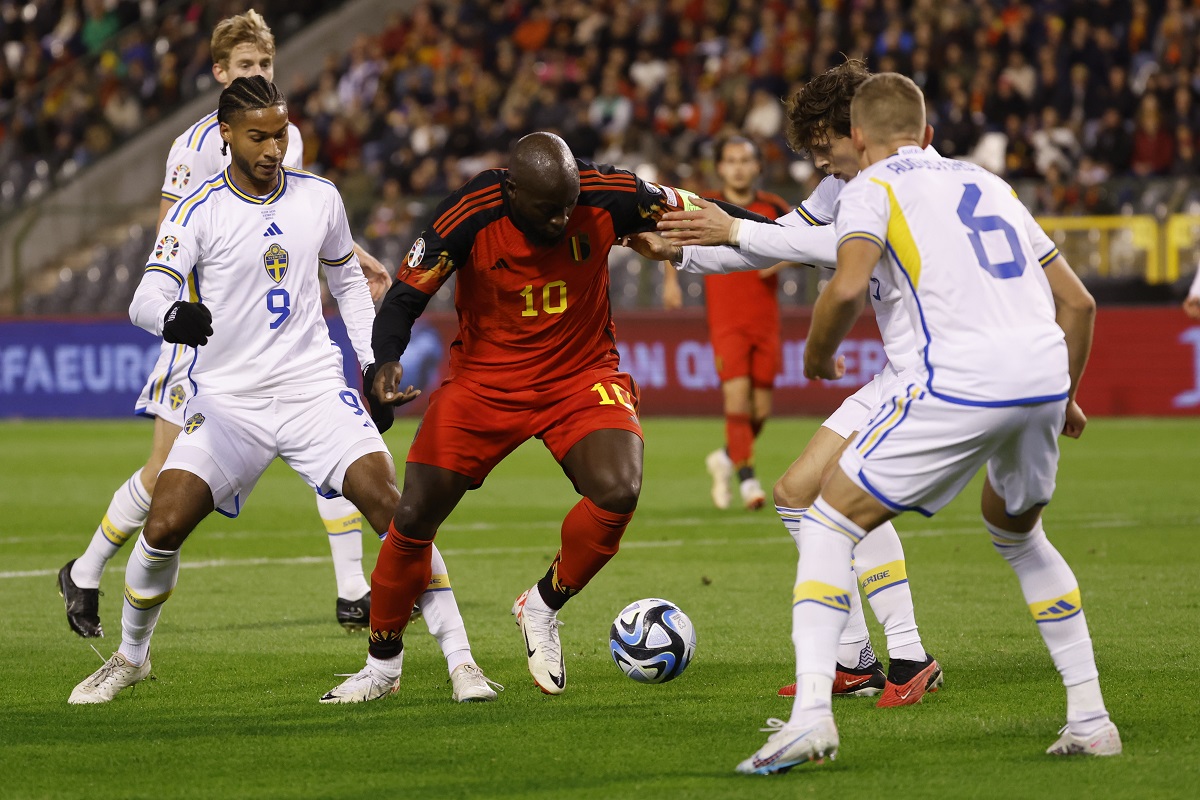 Belgium's Romelu Lukaku, centre, is surrounded by Sweden players during the Euro 2024 group F qualifying soccer match between Belgium and Sweden at the King Baudouin Stadium in Brussels, Monday, Oct. 16, 2023. (AP Photo/Geert Vanden Wijngaert)