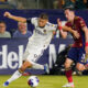 LA Galaxy forward Dejan Joveljic, left, and Real Salt Lake defender Bryan Oviedo vie for the ball during the second half of an MLS soccer match Saturday, Oct. 14, 2023, in Carson, Calif. (AP Photo/Ryan Sun)