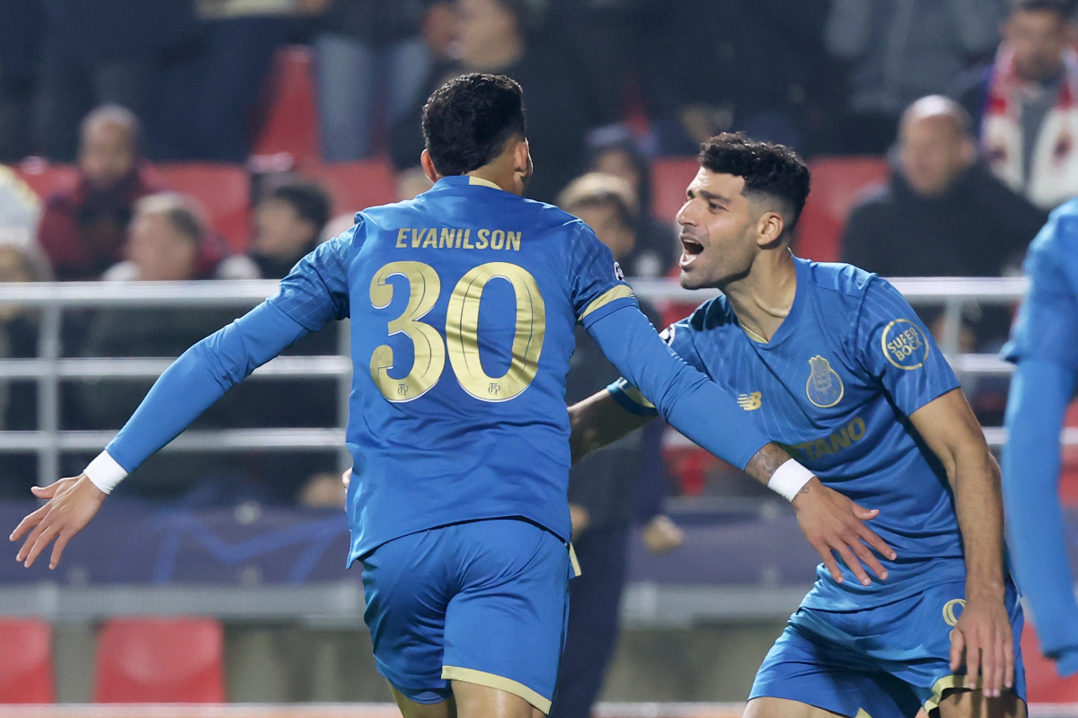 Porto's Evanilson, left, celebrates with Mehdi Taremi after scoring his side's first goal during the Champions League Group H soccer match between Royal Antwerp and FC Porto at the Bosuil Stadium, Antwerp, Belgium, Wednesday, Oct. 25, 2023. (AP Photo/Francois Walschaerts)
