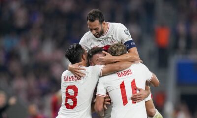 Turkey's Barıs Alper Yılmaz celebrates with teammates after scoring his side's opening goal during the Euro 2024 group D qualifying soccer match between Croatia and Turkey at the Opus Arena in Osijek, Croatia, Thursday, Oct. 12, 2023. (AP Photo/Darko Bandic)