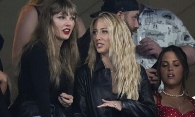 CORRECTS TO BRITTANY MAHOMES NOT BLAKE LIVELY - Taylor Swift, left, and Brittany Mahomes, center, watch play between the New York Jets and the Kansas City Chiefs during the second quarter of an NFL football game, Sunday, Oct. 1, 2023, in East Rutherford, N.J. (AP Photo/Frank Franklin II)