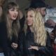 CORRECTS TO BRITTANY MAHOMES NOT BLAKE LIVELY - Taylor Swift, left, and Brittany Mahomes, center, watch play between the New York Jets and the Kansas City Chiefs during the second quarter of an NFL football game, Sunday, Oct. 1, 2023, in East Rutherford, N.J. (AP Photo/Frank Franklin II)