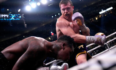 Canelo Alvarez, of Mexico, right, fights Jermell Charlo in a super middleweight title boxing match, Saturday, Sept. 30, 2023, in Las Vegas. (AP Photo/John Locher)