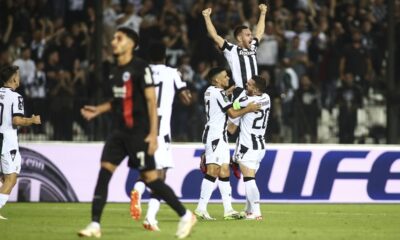 PAOK's Andrija Živković second right, celebrates with teammates after scoring the opening goal against Frankfurt during the Europa Conference League, group G soccer match between PAOK FC and Eintracht Frankfurt at the Toumba stadium in the northern city of Thessaloniki, Greece, Thursday, Oct. 8, 2023. (AP Photo/Giannis Papanikos)