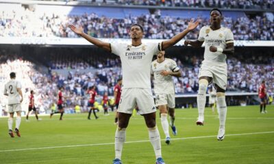 Real Madrid's Jude Bellingham celebrates after scoring his side's opening goal during Spanish La Liga soccer match between Real Madrid and Osasuna at the Santiago Bernabéu stadium in Madrid, Spain, Saturday, Oct. 7, 2023. (AP Photo/Jose Breton)