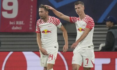 Leipzig's Dani Olmo, right, celebrates after scoring his side's third goal during the group G Champions League soccer match between RB Leipzig and Red Star Belgrade at the Red Bull arena stadium in Leipzig, Germany, Wednesday, Oct. 25, 2023. (AP Photo/Matthias Schrader)