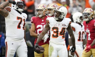 Cleveland Browns offensive tackle Jedrick Wills Jr. (71) and running back Jerome Ford (34) react during the second half of an NFL football game against the San Francisco 49ers Sunday, Oct. 15, 2023, in Cleveland. (AP Photo/Sue Ogrocki)