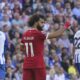 Liverpool's Mohamed Salah, centre, reacts after the Premier League soccer match between Brighton and Hove Albion and Liverpool at the American Express Community Stadium in Brighton, England, Sunday, Oct. 8, 2023. (AP Photo/Alberto Pezzali)