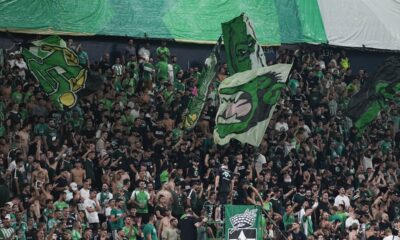 Maccabi fans cheer before a UEFA Europe League match between Panathinaikos and Maccabi Haifa in Haifa, Israel, Thursday, Oct. 5, 2023. (AP Photo/Ohad Zwigenberg)