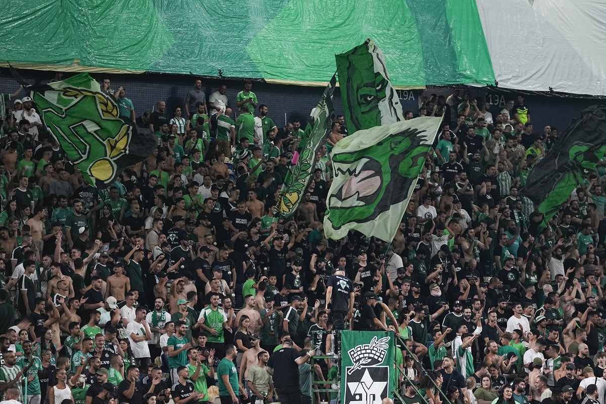 Maccabi fans cheer before a UEFA Europe League match between Panathinaikos and Maccabi Haifa in Haifa, Israel, Thursday, Oct. 5, 2023. (AP Photo/Ohad Zwigenberg)