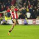 Sheffield United's Oli McBurnie shoots to score from the penalty spot during the English Premier League soccer match between Sheffield United and Manchester United at Bramall Lane in Sheffield, England, Saturday, Oct. 21, 2023. (AP Photo/Jon Super)