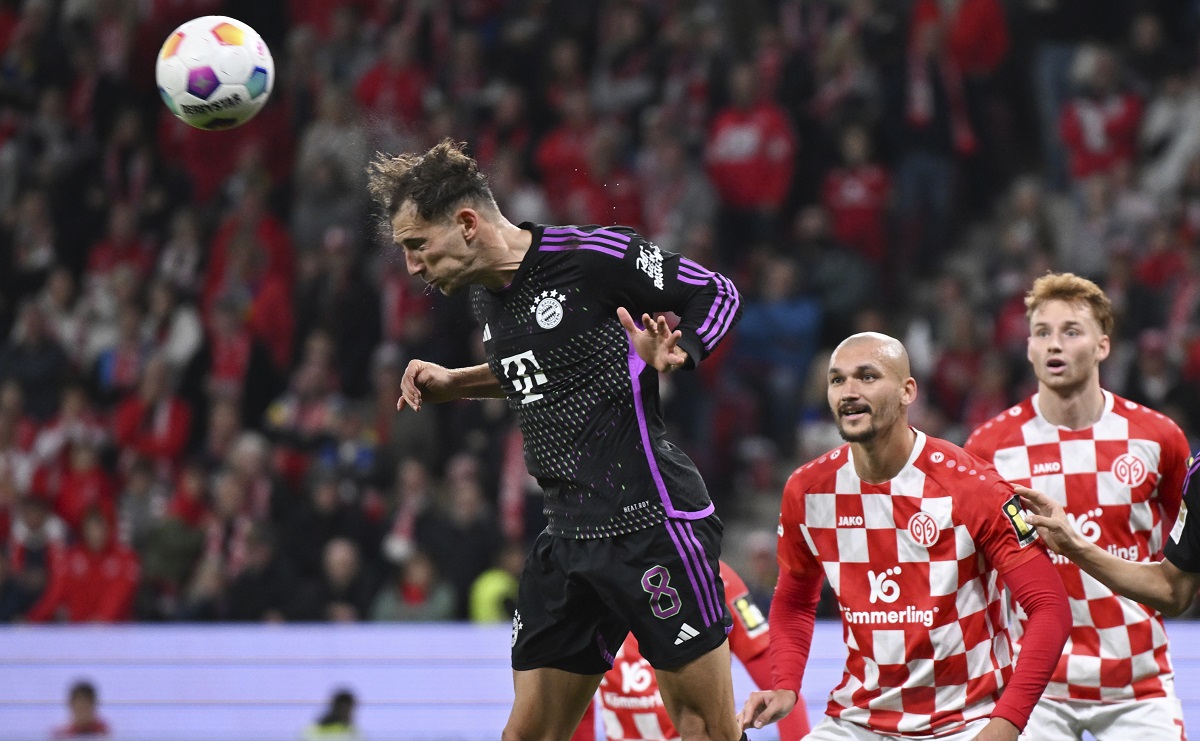 Munich's Leon Goretzka heads the ball, during the Bundesliga soccer match between Mainz 05 and Bayern Munich at Mewa Arena in Mainz, Germany, Saturday, Oct. 21, 2023. (Arne Dedert/dpa via AP)