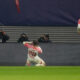 Leipzig's Xavi Simons, centre, celebrates after scoring his side's second goal during the group G Champions League soccer match between RB Leipzig and Red Star Belgrade at the Red Bull arena stadium in Leipzig, Germany, Wednesday, Oct. 25, 2023. (AP Photo/Matthias Schrader)