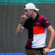 Ugo Humbert of France reacts after losing a point to Daniil Medvedev of Russia during the men's singles quarterfinal match in the China Open tennis tournament at the Diamond Court in Beijing, Monday, Oct. 2, 2023. (AP Photo/Andy Wong)