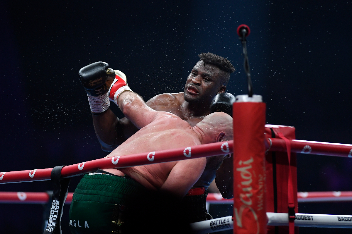 Tyson Fury, of England, the WBC and lineal heavyweight champion, fights with former UFC heavyweight champion Francis Ngannou, of Cameroon, during their boxing match to mark the start of Riyadh Season at Kingdom Arena, in Riyadh, Saudi Arabia, Sunday, Oct. 29, 2023. (AP Photo/Yazeed Aldhawaihi)