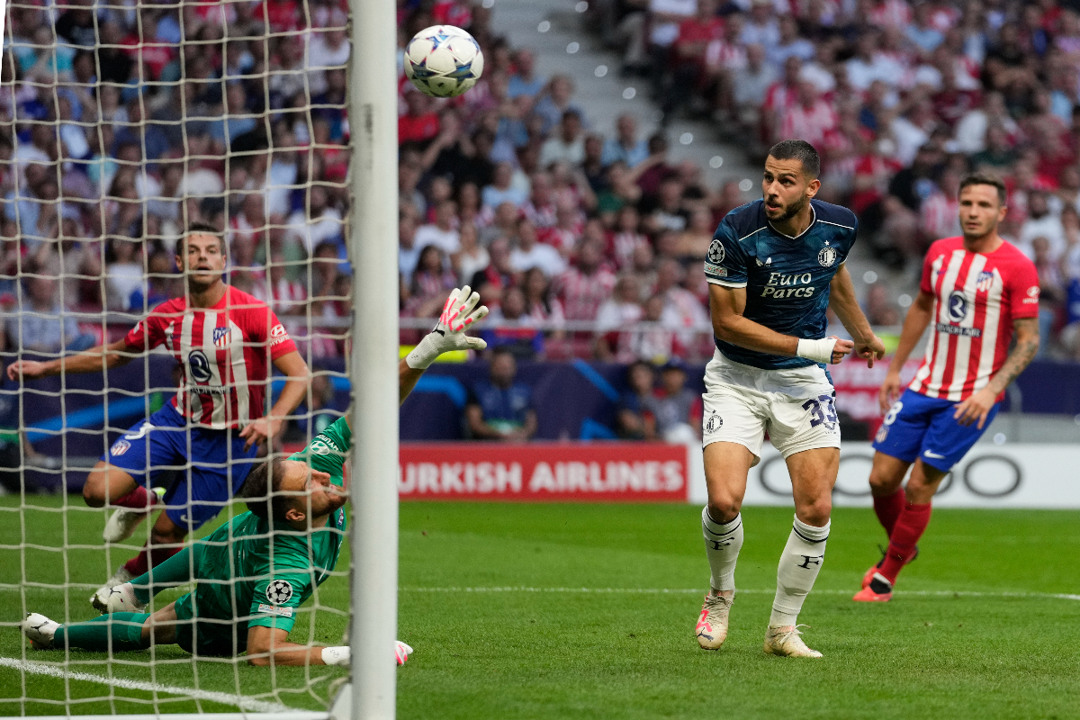 Feyenoord's David Hancko scores his side's second goal during the Champions League Group E soccer match between Atletico Madrid and Feyenoord at the Metropolitano stadium in Madrid, Spain, Wednesday, Oct. 4, 2023. (AP Photo/Bernat Armangue)