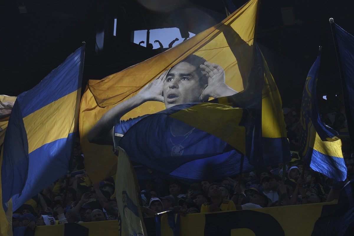 Fans of Boca Juniors cheer for their team during a local tournament soccer match against River Plate at La Bombonera stadium in Buenos Aires, Argentina, Sunday, Oct. 1, 2023. (AP Photo/Gustavo Garello)