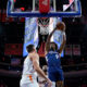Philadelphia 76ers' Kelly Oubre Jr., right, goes up for a shot against Phoenix Suns' Kevin Durant, center, and Grayson Allen during the first half of an NBA basketball game, Saturday, Nov. 4, 2023, in Philadelphia. (AP Photo/Matt Slocum)