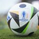 A UEFA Euro 2024 Ball lays on the ground during a presentation of the new ball in Berlin, Germany, Wednesday, Nov. 15, 2023. The ball is named 'Fussballliebe' - 'Footbal Love' or 'Soccer Love'. (AP Photo/Markus Schreiber)
