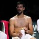 Serbia's Novak Djokovic rests on the bench during a Davis Cup quarter-final tennis match against Britain's Cameron Norrie in Malaga, Spain, Thursday, Nov. 23, 2023. (AP Photo/Manu Fernandez)