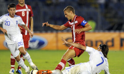 FUDBAL - NEMANJA VIDIC, fudbaler Srbije, na utakmici protiv Grcke, i IAONNIS PAPADOPOULOS i GEORGIOS SAMARAS Jorgos. Beograd, 11.08.2010. photo:N.Parausic