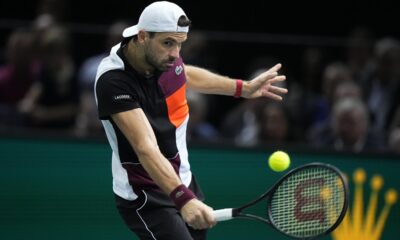 Bulgaria's Grigor Dimitrov returns the ball to Serbia's Novak Djokovic during the final match of the Paris Masters tennis tournament at the Accor Arena, in Paris, Sunday, Nov. 5, 2023. (AP Photo/Michel Euler)