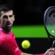 Serbia's Novak Djokovic eyes the ball as he plays a shot against Britain's Cameron Norrie during a Davis Cup quarter-final tennis match between Serbia and United Kingdom in Malaga, Spain, Thursday, Nov. 23, 2023. (AP Photo/Manu Fernandez)