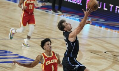 Orlando Magic's Franz Wagner shoots against Atlanta Hawks' Johnson Jalen, during the first half of an NBA basketball game, at the Mexico Arena in Mexico City, Thursday, Nov. 9, 2023. (AP Photo/Eduardo Verdugo)
