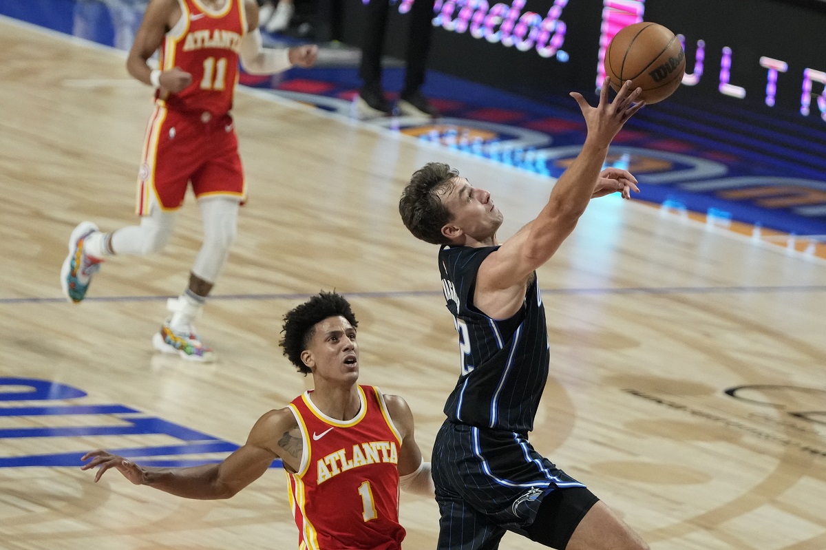 Orlando Magic's Franz Wagner shoots against Atlanta Hawks' Johnson Jalen, during the first half of an NBA basketball game, at the Mexico Arena in Mexico City, Thursday, Nov. 9, 2023. (AP Photo/Eduardo Verdugo)
