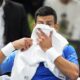 Serbia's Novak Djokovic wipes her face with a towel during the quarterfinal match against Denmark's Holger Rune at the Paris Masters tennis tournament, at the Accor Arena in Paris, Friday, Nov. 3, 2023. (AP Photo/Michel Euler)