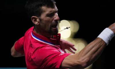 Serbia's Novak Djokovic plays a shot against Britain's Cameron Norrie during a Davis Cup quarter-final tennis match between Serbia and United Kingdom in Malaga, Spain, Thursday, Nov. 23, 2023. (AP Photo/Manu Fernandez)