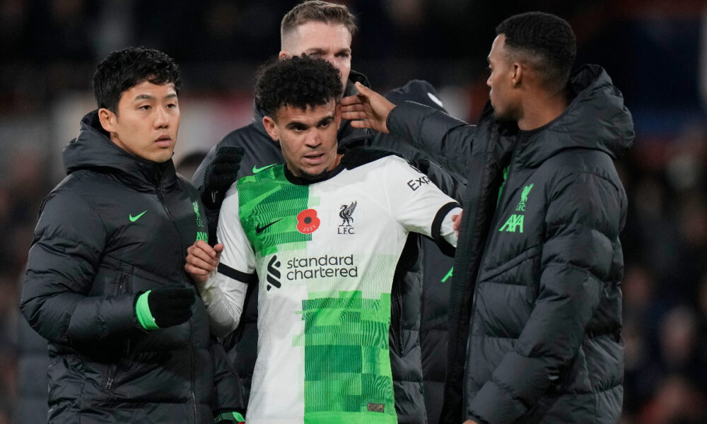Liverpool's Luis Diaz celebrates with his teammates at the end of the English Premier League soccer match between Luton Town and Liverpool, at Kenilworth Road, in Luton, England, Sunday, Nov. 5, 2023. (Alastair Grant)