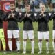 Israel's players gesture and sing the Israeli national anthem prior to the Euro 2024 group I qualifying soccer match between Kosovo and Israel at the Fadil Vokrri stadium in Pristina, Kosovo, Sunday, Nov. 12, 2023. (AP Photo/Visar Kryeziu)