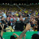 Policemen try to stop a fight between Brazilian and Argentinians fans at the stands prior to a qualifying soccer match for the FIFA World Cup 2026 at Maracana stadium in Rio de Janeiro, Brazil, Tuesday, Nov. 21, 2023.(AP Photo/Silvia Izquierdo)