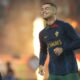 Portugal's Cristiano Ronaldo smiles as he warms up before the Euro 2024 group J qualifying soccer match between Portugal and Iceland, at the Alvalade Stadium in Lisbon, Sunday, Nov. 19, 2023. (AP Photo/Armando Franca)