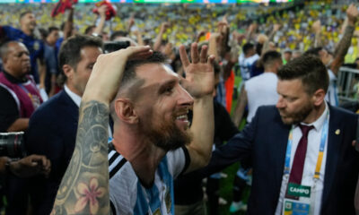Argentina's Lionel Messi and teammates celebrate their team's 1-0 victory over Brazil at the end of a qualifying soccer match for the FIFA World Cup 2026 at Maracana stadium in Rio de Janeiro, Brazil, Tuesday, Nov. 21, 2023. (AP Photo/Silvia Izquierdo)