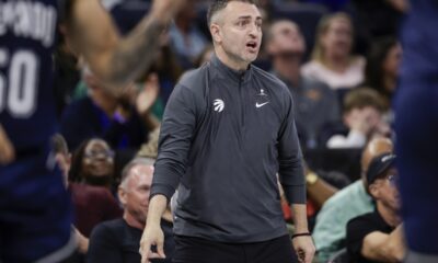 Toronto Raptors coach Darko Rajakovic watches the team play against the Orlando Magic during the second half of an NBA basketball In-Season Tournament game Tuesday, Nov. 21, 2023, in Orlando, Fla. (AP Photo/Kevin Kolczynski)