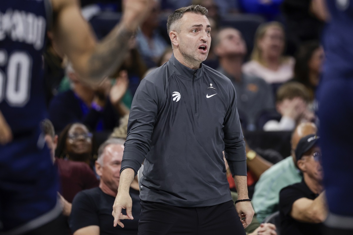 Toronto Raptors coach Darko Rajakovic watches the team play against the Orlando Magic during the second half of an NBA basketball In-Season Tournament game Tuesday, Nov. 21, 2023, in Orlando, Fla. (AP Photo/Kevin Kolczynski)