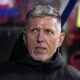 Czech Republic coach Jaroslav Silhavy sits on the bench before the Euro 2024 group E qualifying soccer match between the Czech Republic and Moldova, at the Andruv Stadium in Olomouc, Czech Republic, Monday, Nov. 20, 2023. (AP Photo/Petr David Josek)