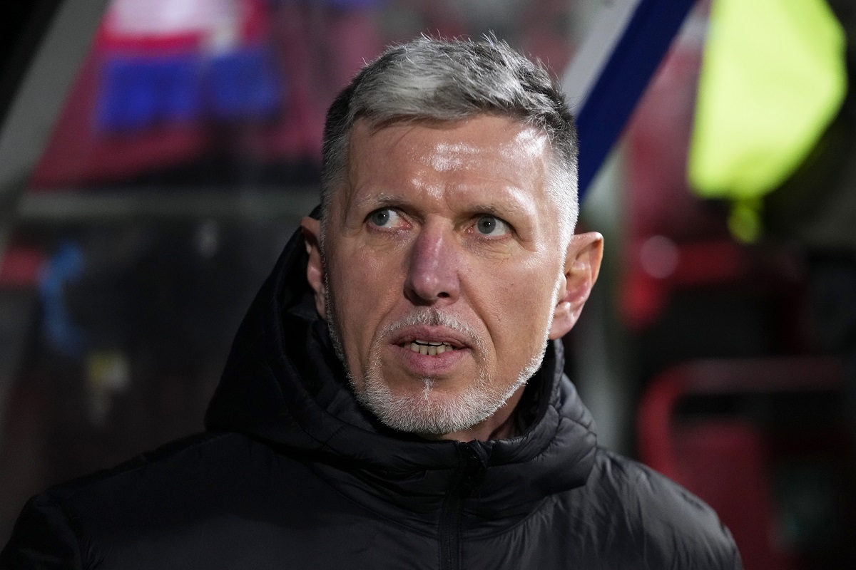 Czech Republic coach Jaroslav Silhavy sits on the bench before the Euro 2024 group E qualifying soccer match between the Czech Republic and Moldova, at the Andruv Stadium in Olomouc, Czech Republic, Monday, Nov. 20, 2023. (AP Photo/Petr David Josek)