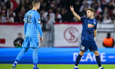 Topola's goalkeeper Veljko Ilic, left, and his teammate Nemanja Petrovic, right, react during the Europa League Group A soccer match between SC Freiburg and TSC Backa Topola in Freiburg, Germany, Thursday, Nov. 9, 2023 (Tom Weller/dpa via AP)