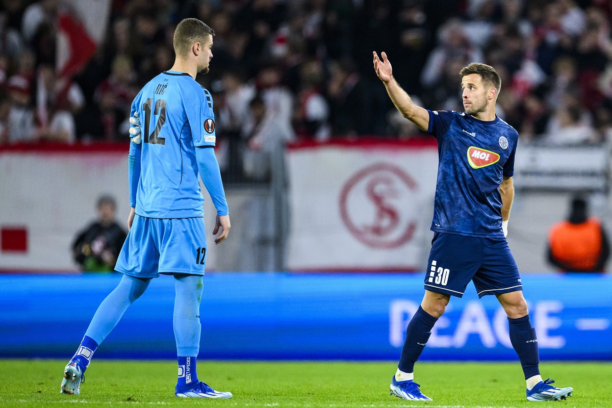 Topola's goalkeeper Veljko Ilic, left, and his teammate Nemanja Petrovic, right, react during the Europa League Group A soccer match between SC Freiburg and TSC Backa Topola in Freiburg, Germany, Thursday, Nov. 9, 2023 (Tom Weller/dpa via AP)