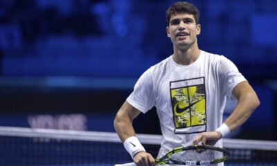 Spain's Carlos Alcaraz reacts as he plays Serbia's Novak Djokovic during a training session ahead of the ATP Finals, in Turin, Italy, Friday, Nov. 10, 2023. (Marco Alpozzi/LaPresse via AP)